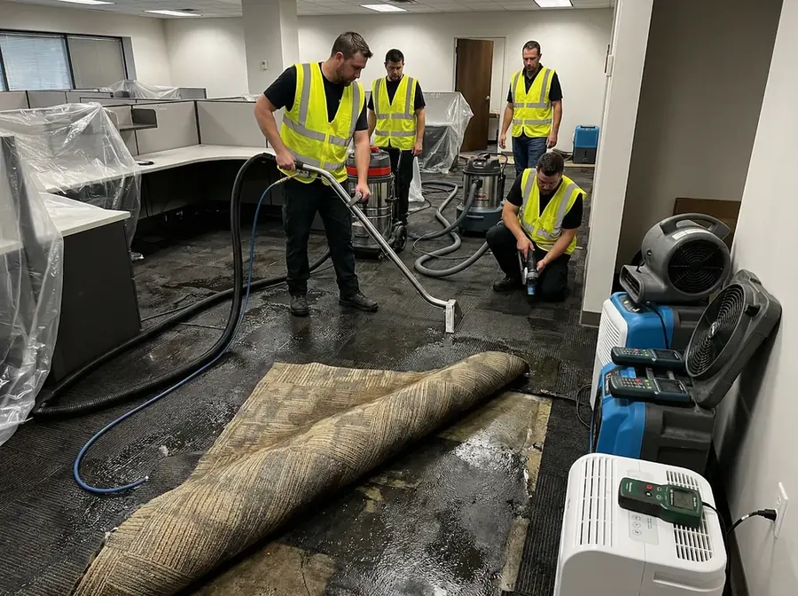 Restoration crew drying a MetroWest commercial space in Natick